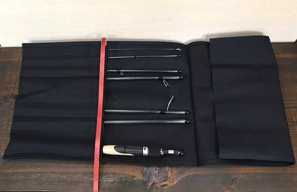オーダーメイドのプレゼントやギフトに6号帆布で釣り竿を巻いて収納するロッドケースをオーダー製作